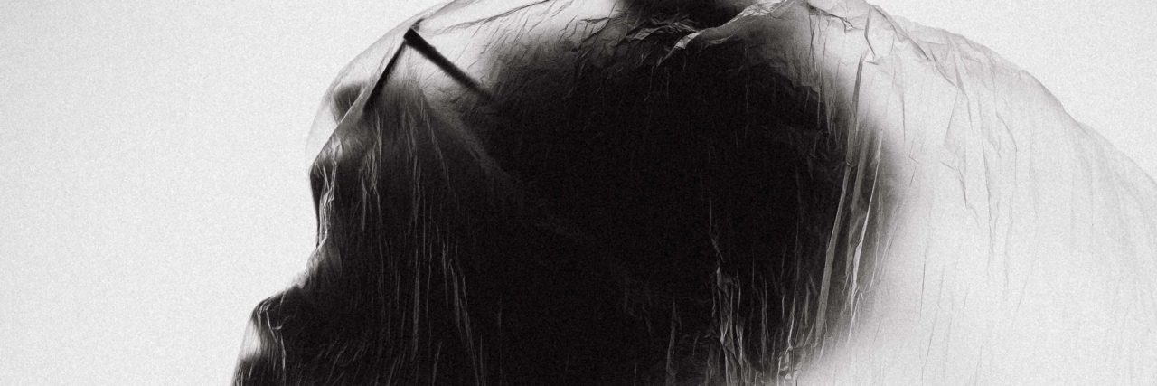 Challenging the Stigma Around Male Borderline Personality Disorder man screaming under sheet in black and white