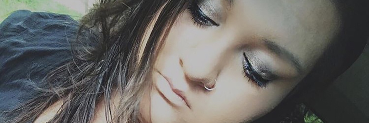 What My Depression Tells Me young woman with depression looking upset