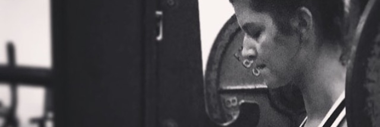 How Weightlifting Saves Me From Depression and Anxiety woman powerlifting