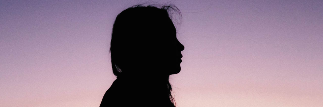 Why Putting My Mental Health First Meant Cutting Out Some Friendships woman silhouette