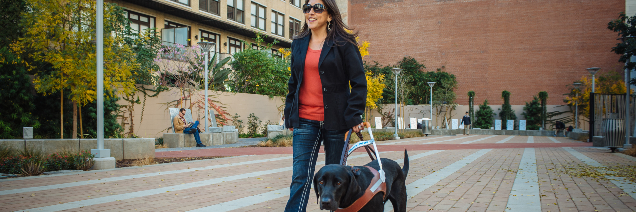 Guide Dog Team Survey Reveals Joys and Obstacles Theresa with her guide dog.