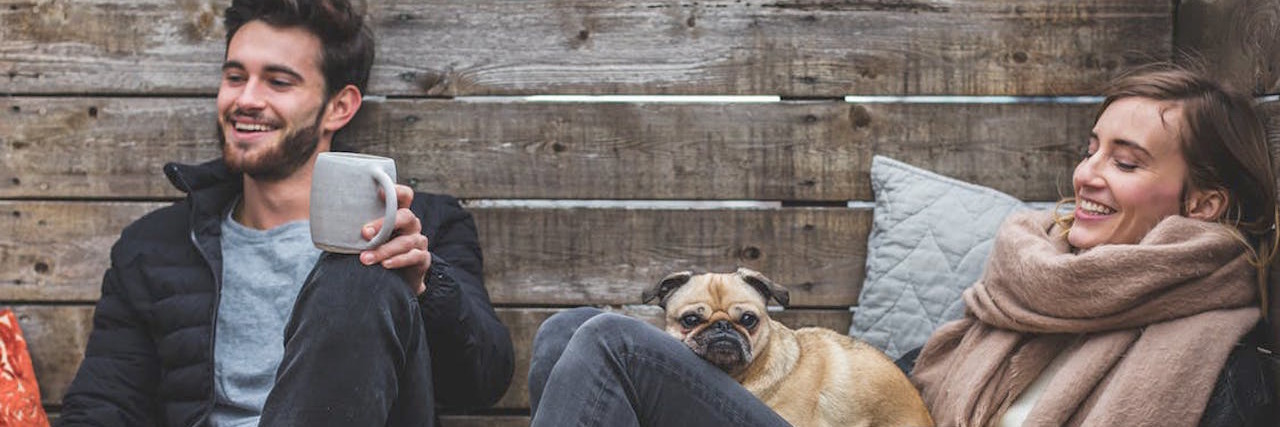 The Difficulty of Socializing With Chronic Illness friends sitting outside and talking