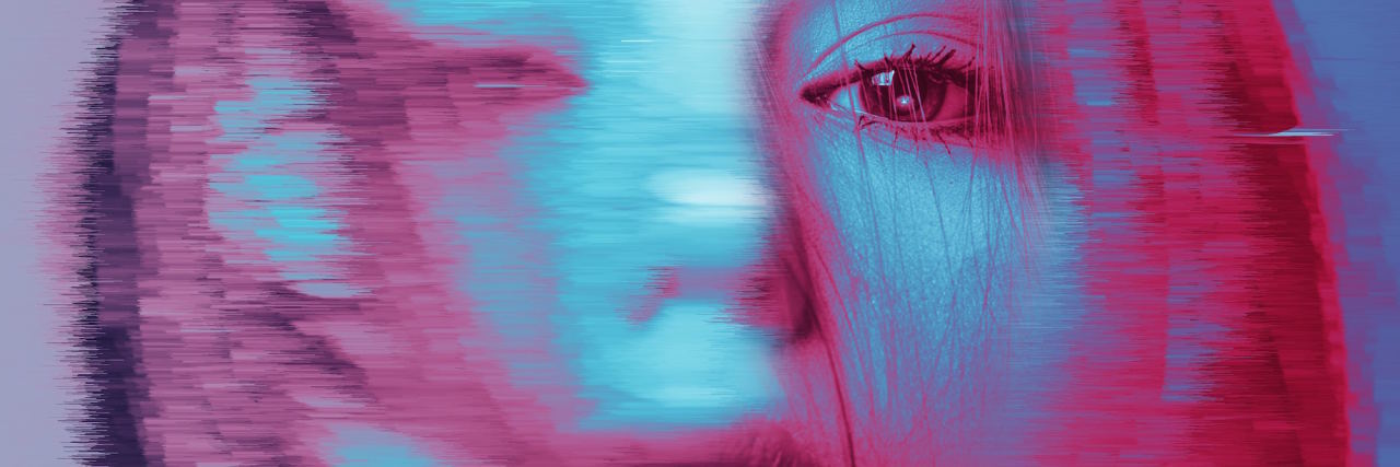 7 Tips To Help Someone Who Is Dissociating A woman stares at the camera, her long hair swinging forward, but most of the image is blurred with motion and only one of her eyes is clear.