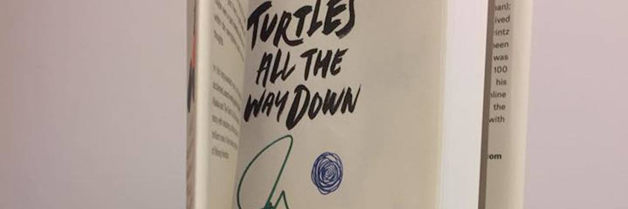 Why I Relate to 'Turtles All the Way Down' john green book "turtles all the way down" stacked on one another