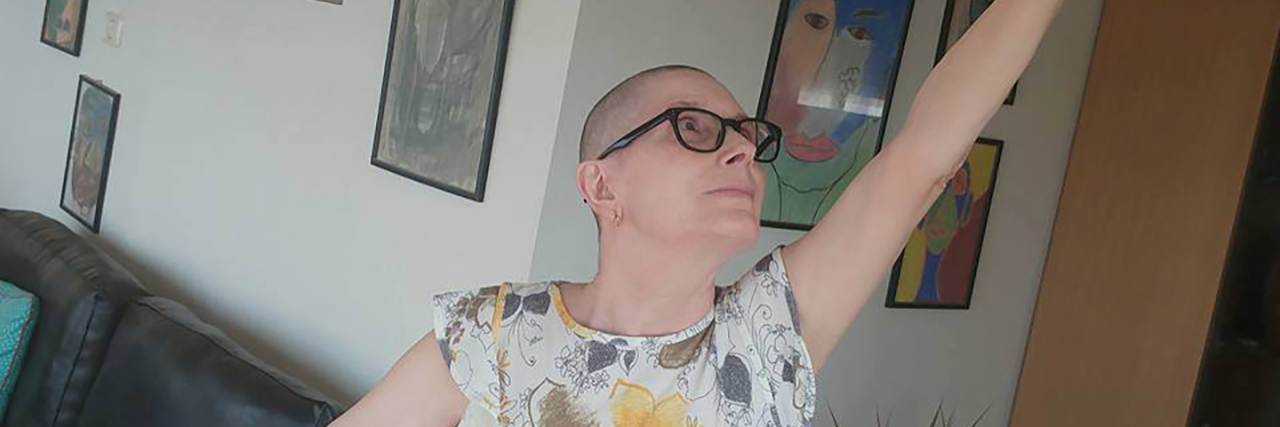 How We Can Make Society Inclusive of Disability and Differences Khulud's mother poses boldly for a photo.