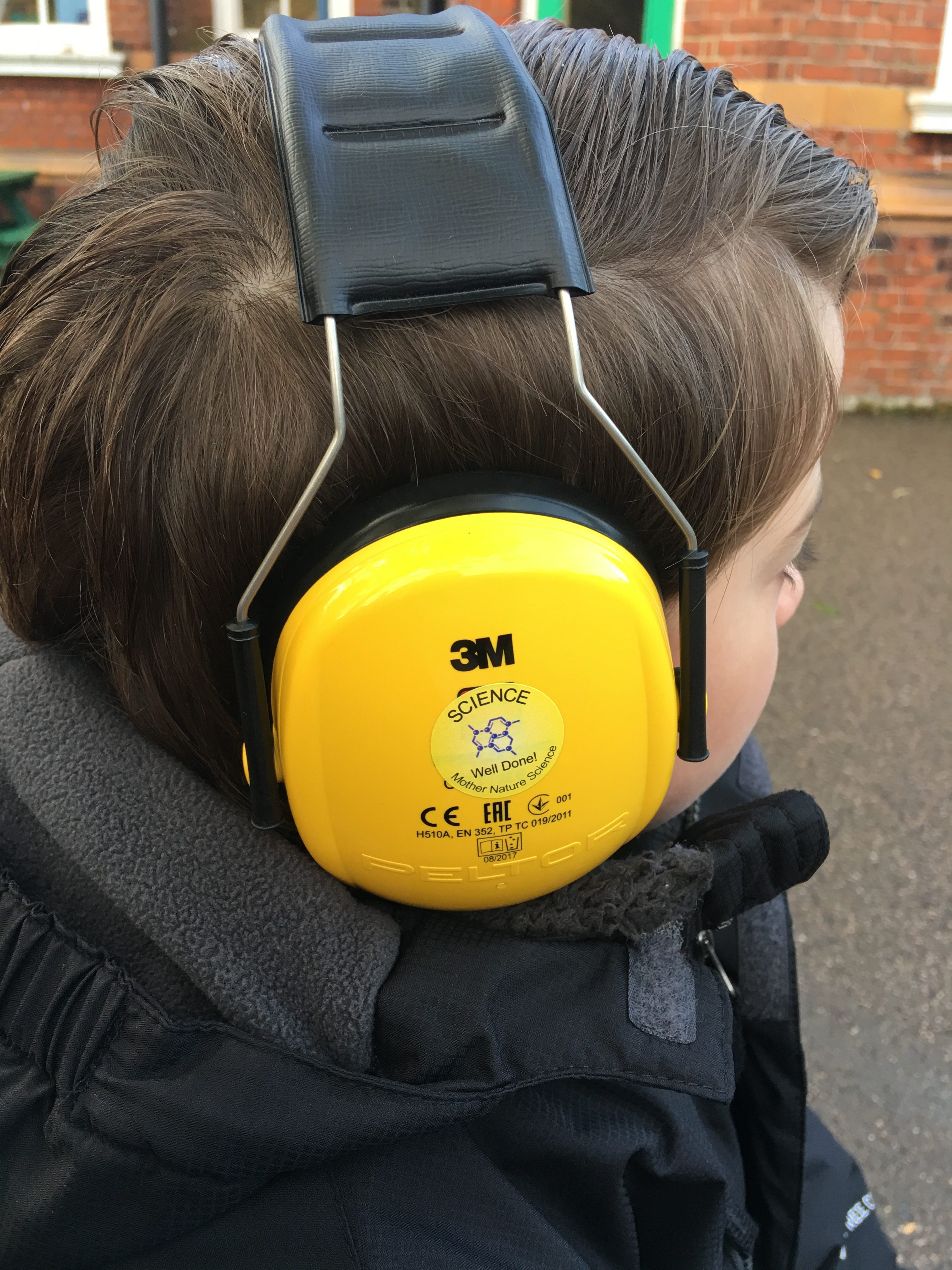 autistic boy with headphones on