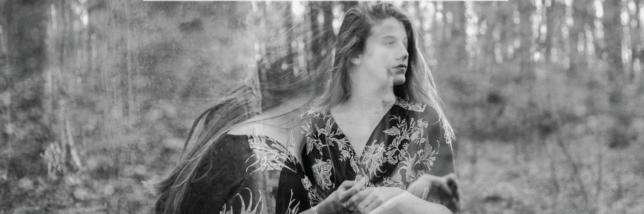 18 Things People Don't Realize You're Doing Because of Dissociation woman in forest blurry double exposure