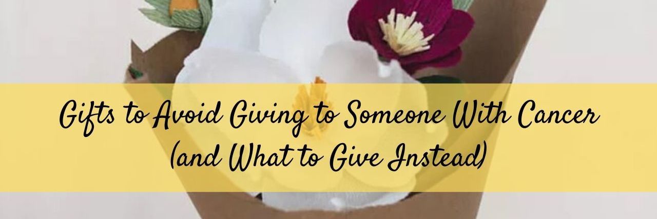 Gifts to Avoid Giving Someone With Cancer (and What to Give Instead) paper flower bouquet being held