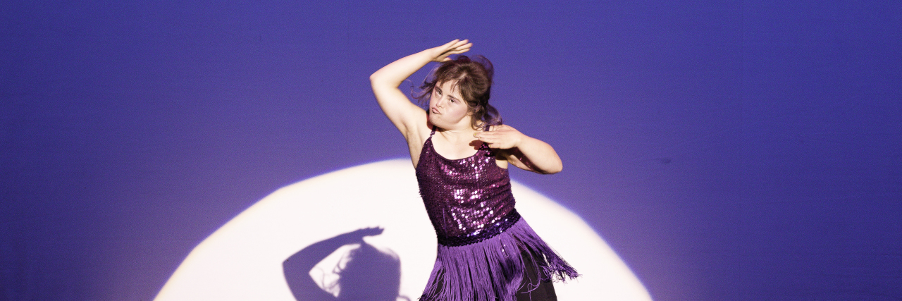 Girl with Down syndrome at dance competition