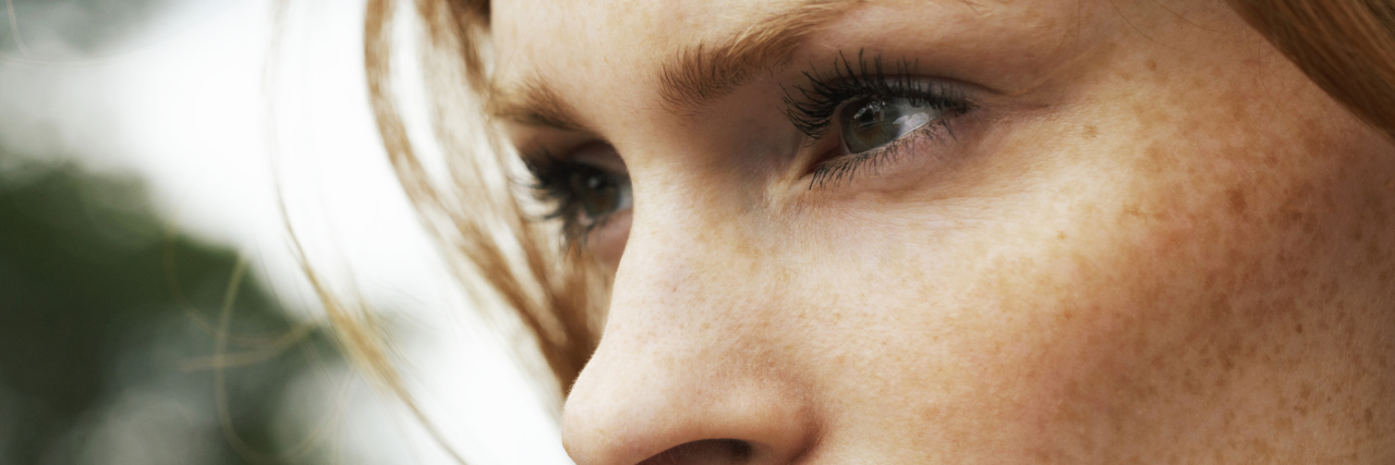 To My Obsessive-Compulsive Disorder, on How It's Affected Me woman looking defiant away from camera side view close up