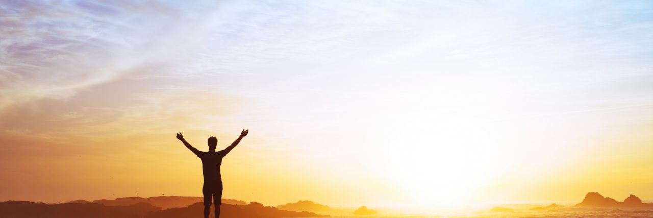 My Freedom Philosophy Explained (and How I Came to Terms With Cancer) freedom concept, man with raised hands, silhouette