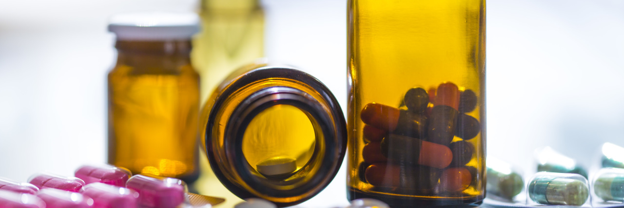 Coping With Chronic Pain From Cerebral Palsy Pills and bottles.