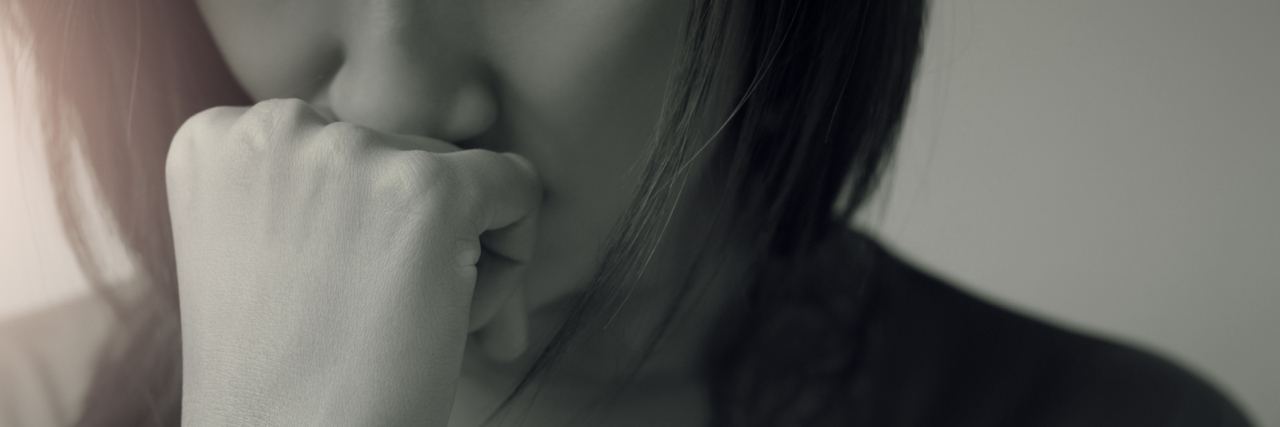 The Lies I Tell My Family as a Mom With Depression sad woman