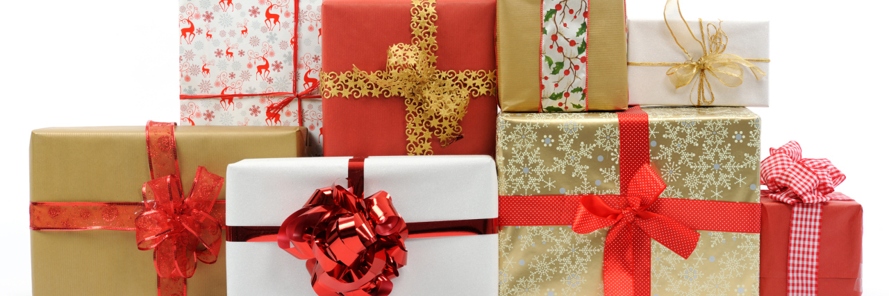 Gifts for the Brain Injury Survivor on Your Holiday List Christmas gifts on white background.