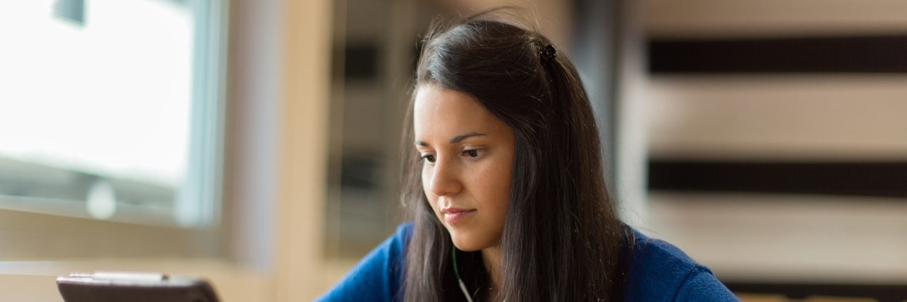 What My Epilepsy Looks Like Young woman studying at university.