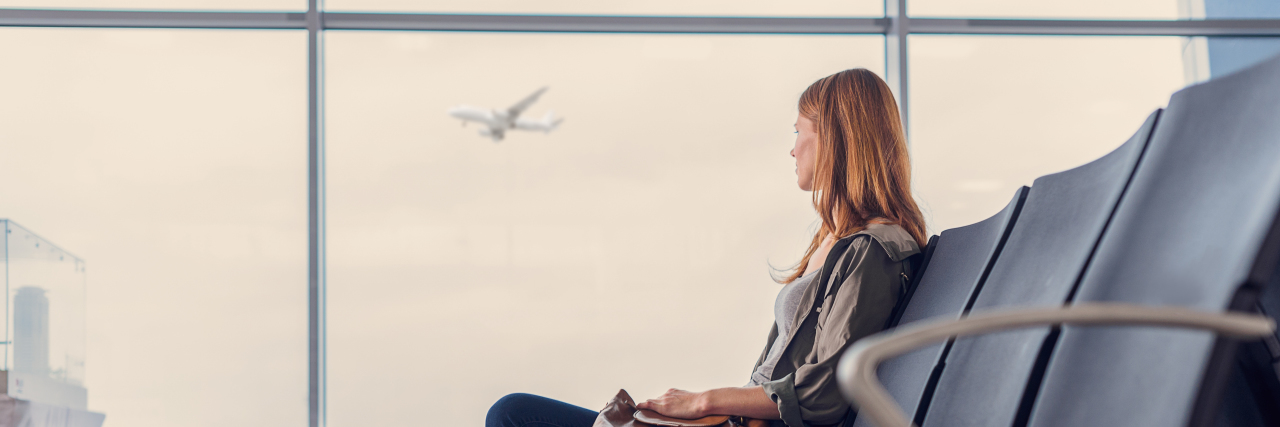 Holiday Travel With PTSD girl waiting for boarding