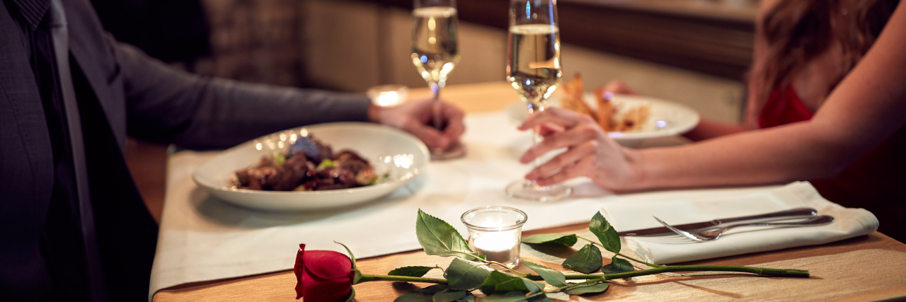 Couple dating having dinner in restaurant.