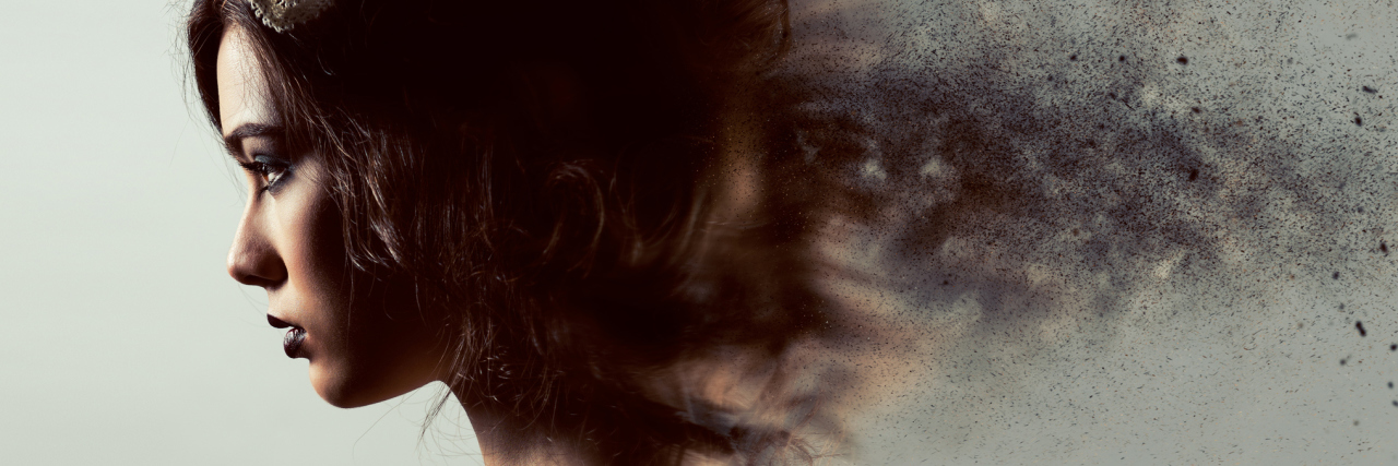 What My Post-Traumatic Stress Disorder Looked Like on a Brain Scan profile of young woman with cloudy digital effects on hair and back of head