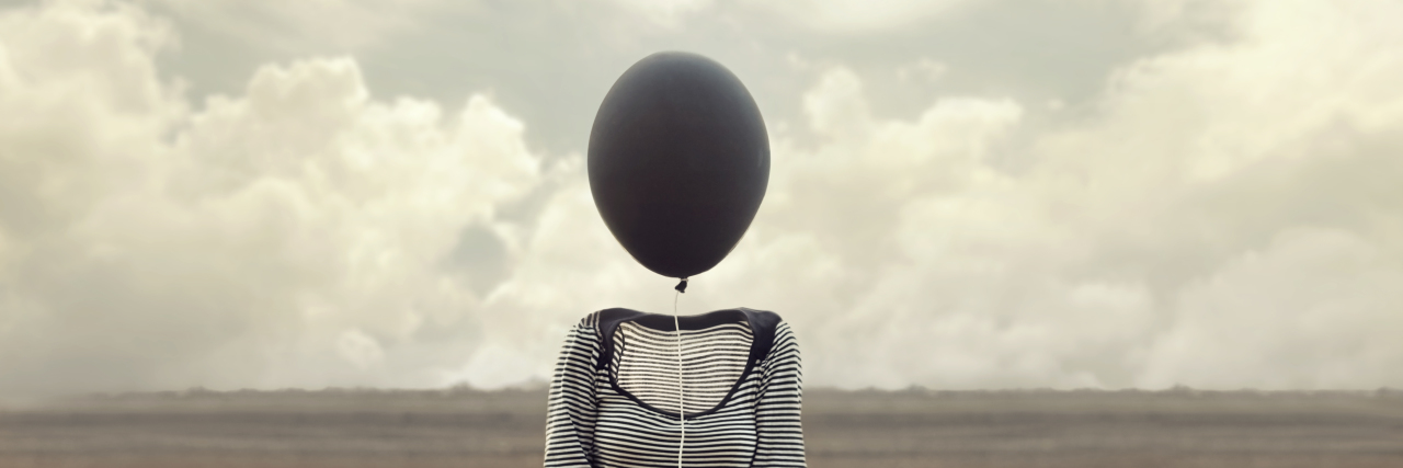 Mental Illness Makes Nothing Feel Right – Even When Nothing Is Wrong woman's head replaced by a black balloon
