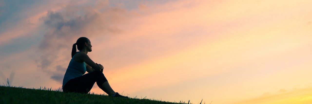 The Reality of My Cancer Scare and How You Can Learn From It Woman watching sunset