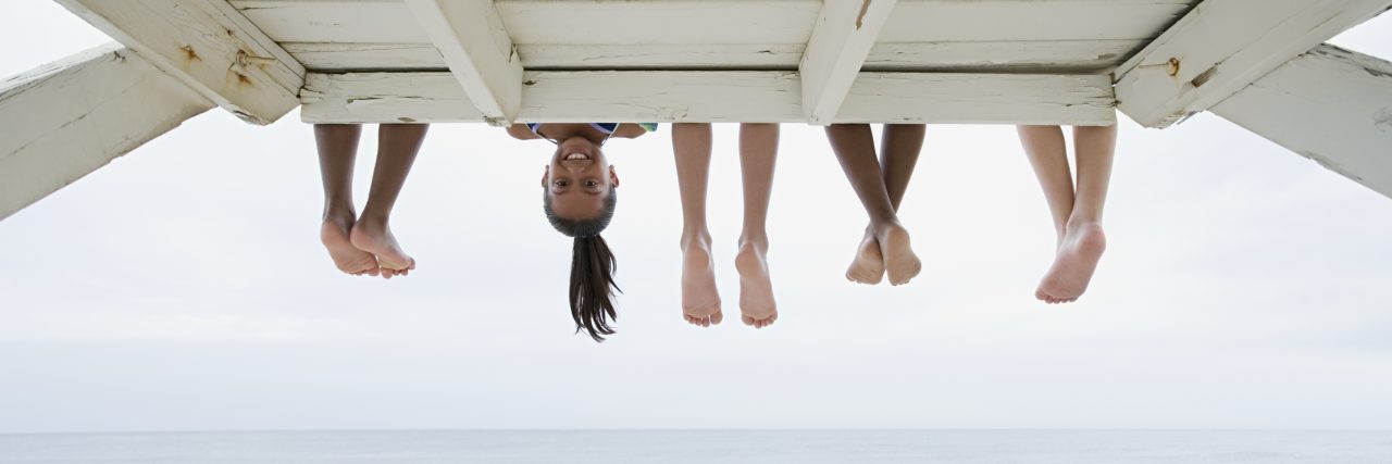 A Thank You to My Friends on Thanksgiving and Every Day of the Year Girl upside down on a dock
