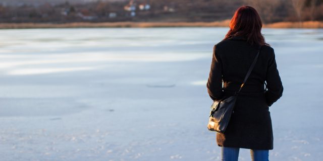 What It's Like Facing a Breast Cancer Diagnosis During the Holidays Girl on the frozen lake.