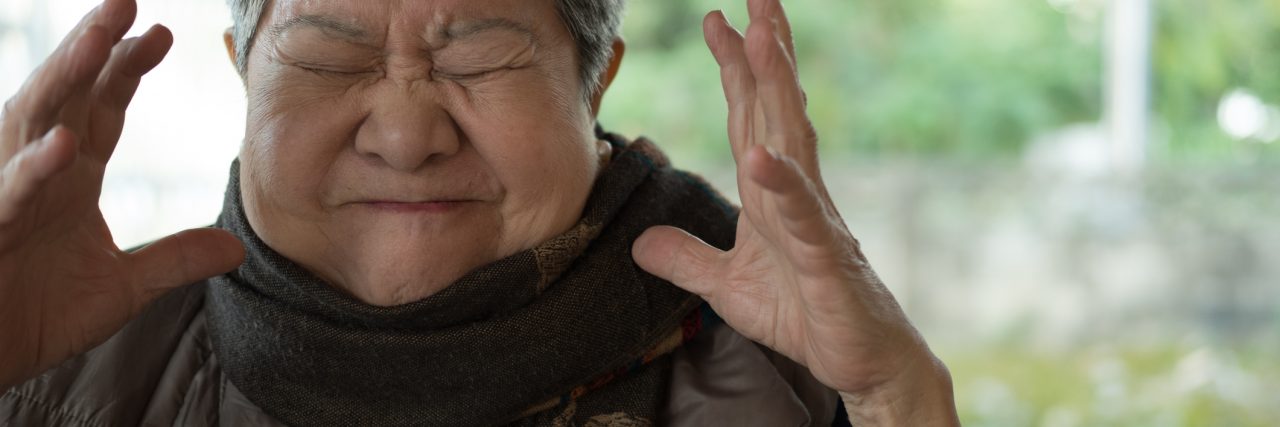 Why Anger Is Difficult to Process With Borderline Personality Disorder portrait of furious elder woman, enraged elderly female, angry asian senior
