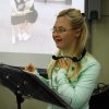 Grace, woman with Down syndrome, giving speech at a school
