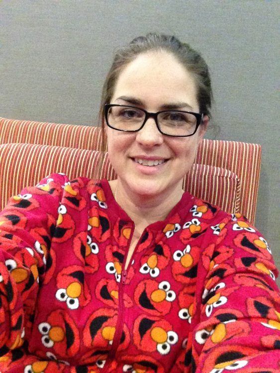author wearing elmo pajamas