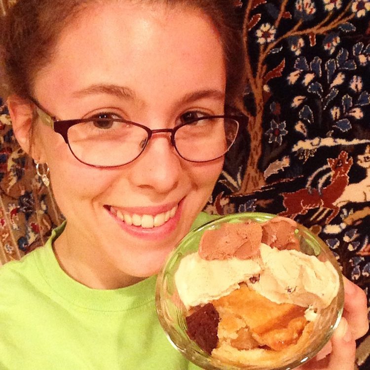 woman smiling and holding her celiac thanksgiving dinner