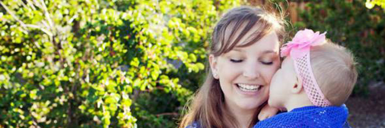 After 4 Years, I've Finally Found Beauty in the Midst of My Grief Katie holding Olivia Caldwell