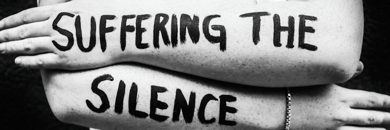 Finding Purpose at an Internship While Living With Lyme Disease "suffering the silence" painted on a woman's arms
