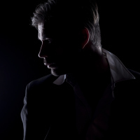 A man's silhouette.