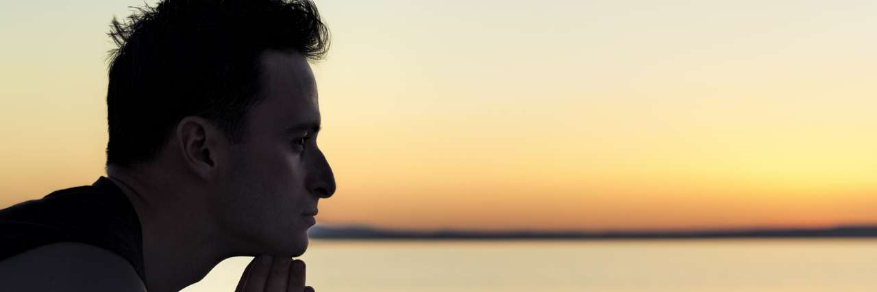 Even After Losing You to Cancer, I Remain A Hopeful Man Pensive man silhouette