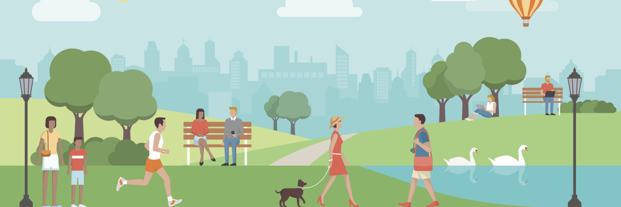 Being Deaf in 'Hearingtown' People relaxing in nature in a beautiful urban park, city skyline in the background.