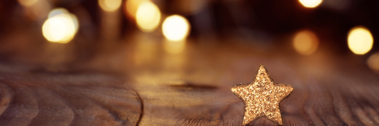 Christmas background with stars and bokeh