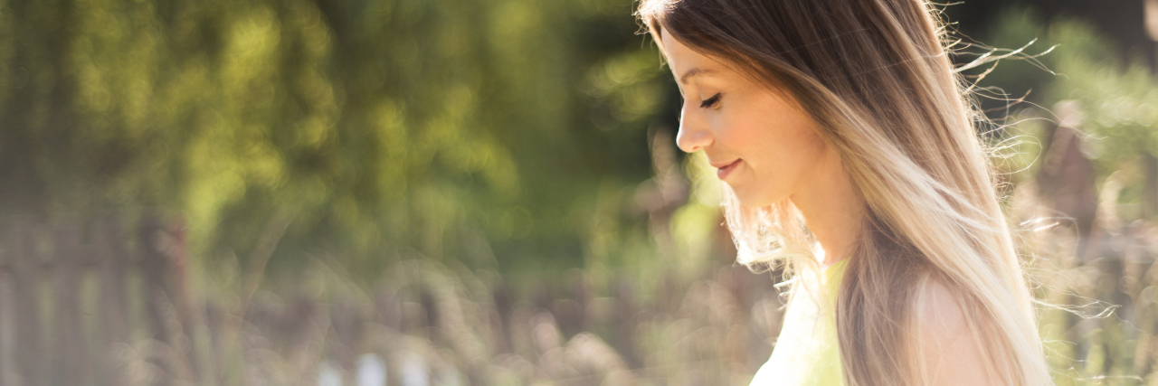 Eliminating Toxins From Personal Care Products Due to Lyme Disease woman walking outside