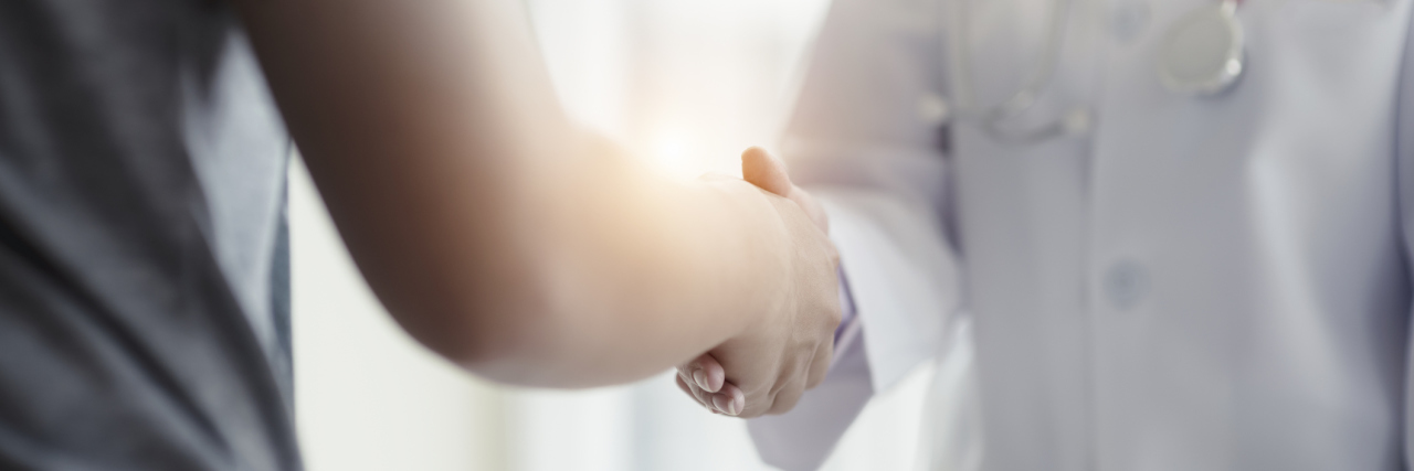 Feeling Validated by a Doctor After Diagnosis of Behcet's Disease doctor shaking hands with a patient