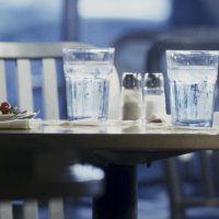 Glasses of water on a table in a restaurant