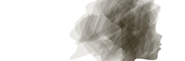 A silhouette image of a woman's head.