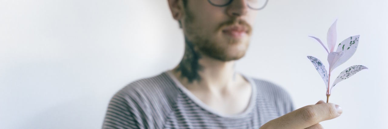 When Borderline Personality Disorder Makes You Love 'Too Much' man with leaf