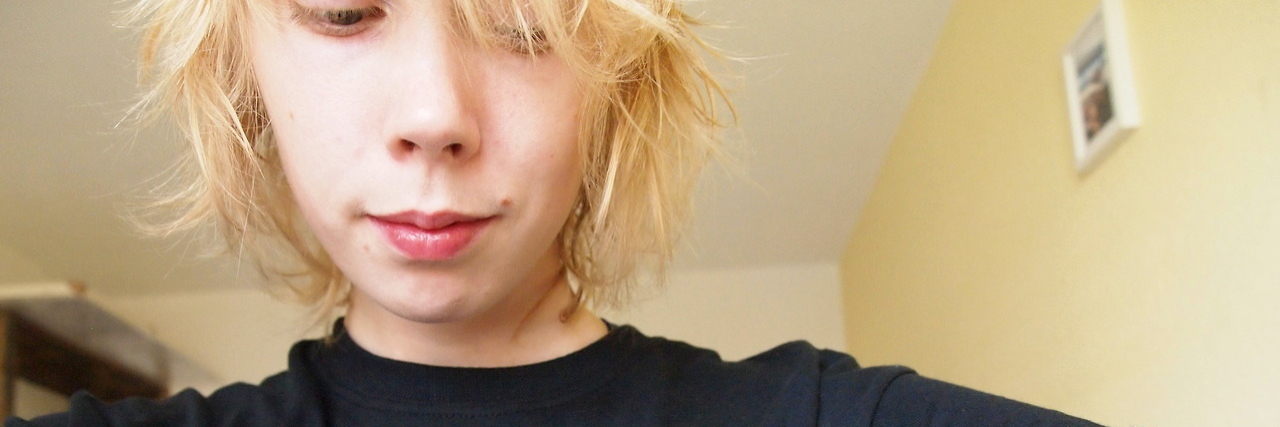 When Your Mental Illness Makes You Want to Punish Yourself young blonde woman selfie wearing ok to not be ok t-shirt