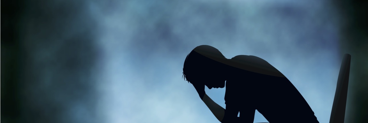 What It Feels Like to Lose Support With Hypersomnia the silhouette of a man sitting on a chair with his down