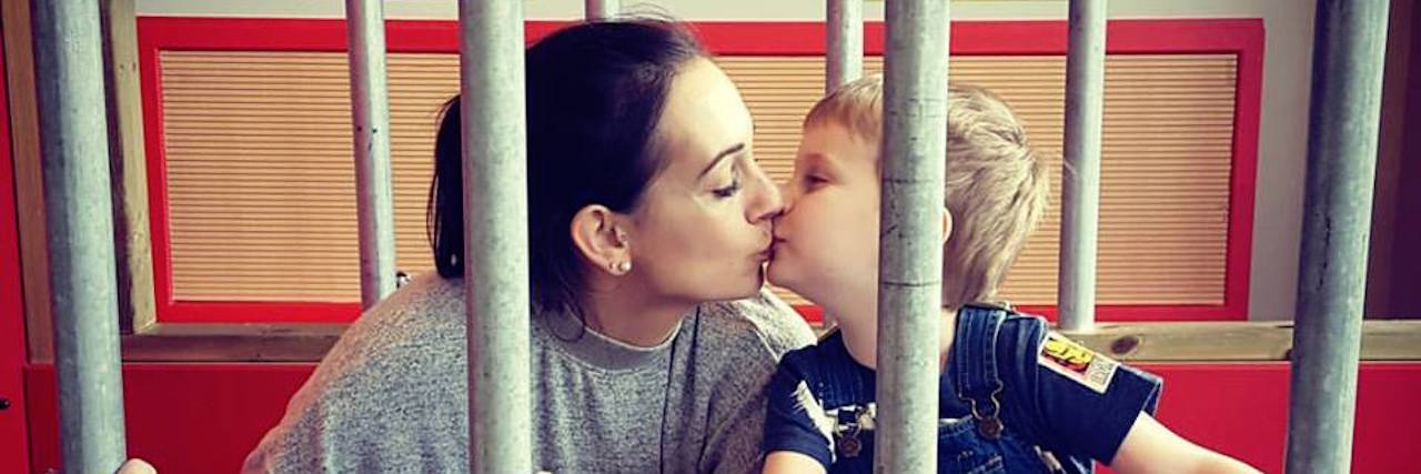 When You're a Pregnant Mum Struggling With Anorexia mom kissing her son as the play together