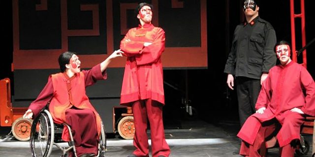 Robin performing in a play.
