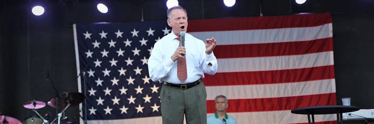Why I Shared My Sexual Assault Story After Roy Moore Was Accused Roy Moore speaking on stage