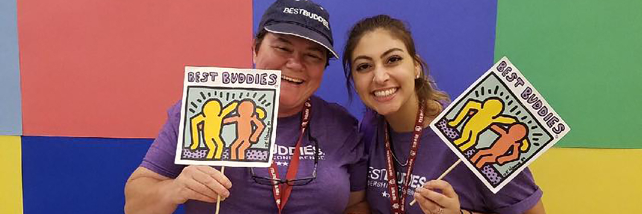 My Life With an Intellectual Disability Jennifer posing with a friend from Best Buddies.