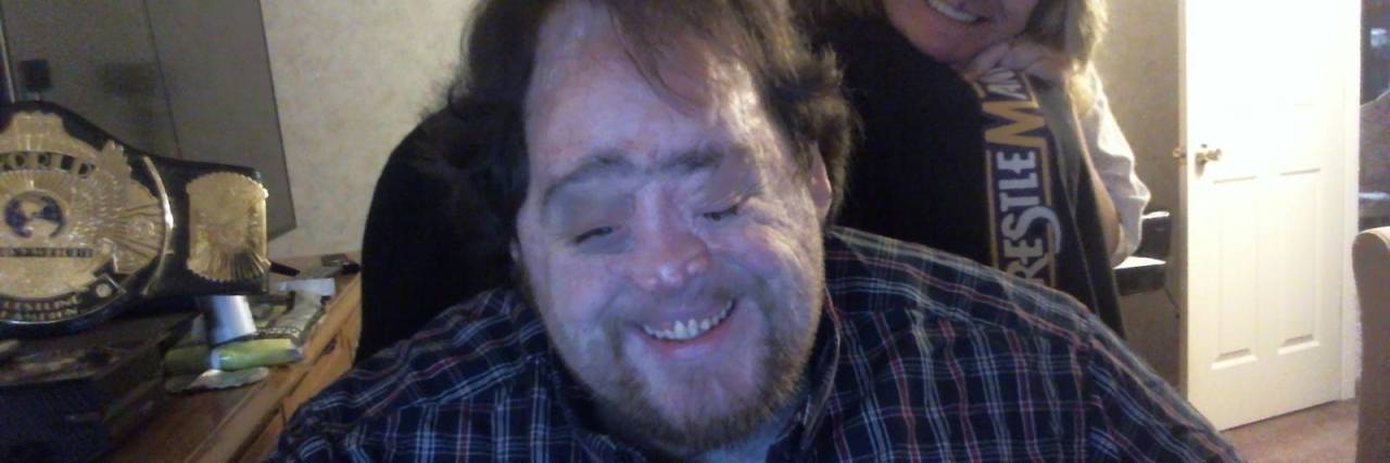 Going Through a Craniofacial Journey: It Gets Better Corey sitting in a chair.