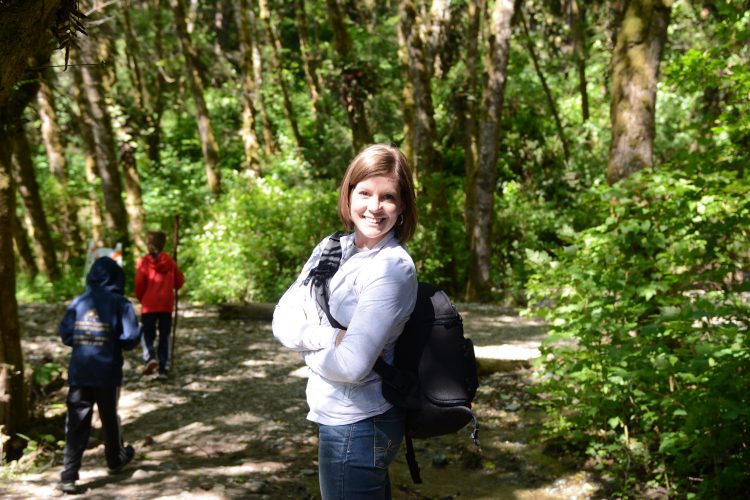 Mel Gunnell hiking in woods