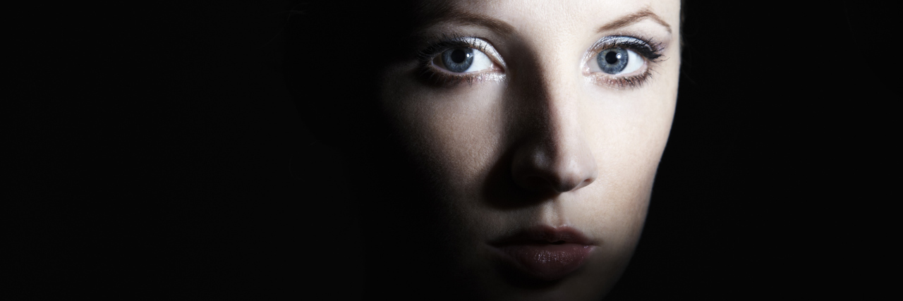 If You're Thinking About Your Health and Asking, 'How Did This Happen?' A woman with a dark shadow covering some of her face.